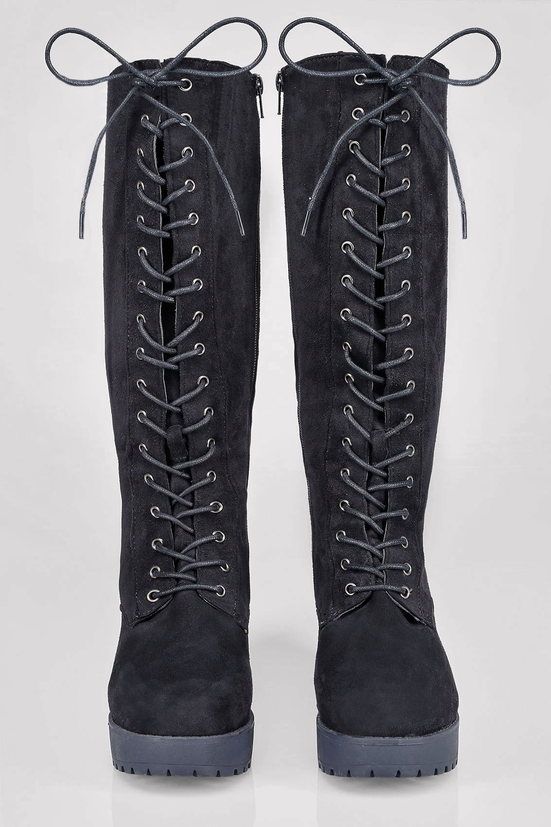Flat black knee high lace up boots