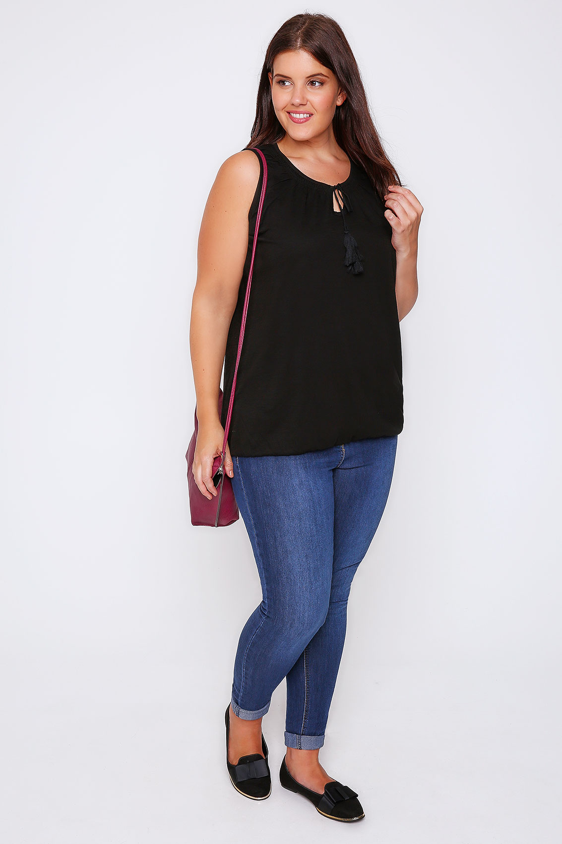 black sleeveless knit vest