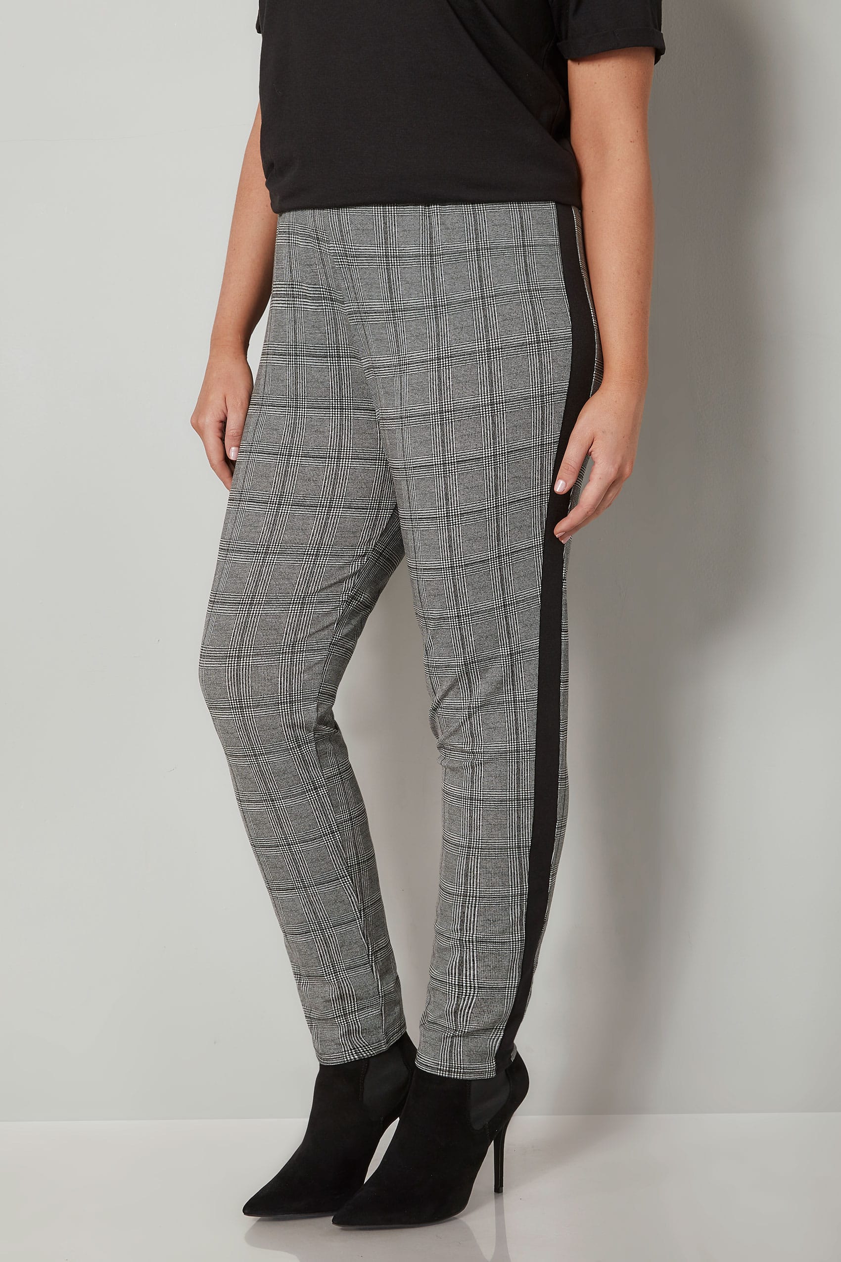 white stripe black trousers