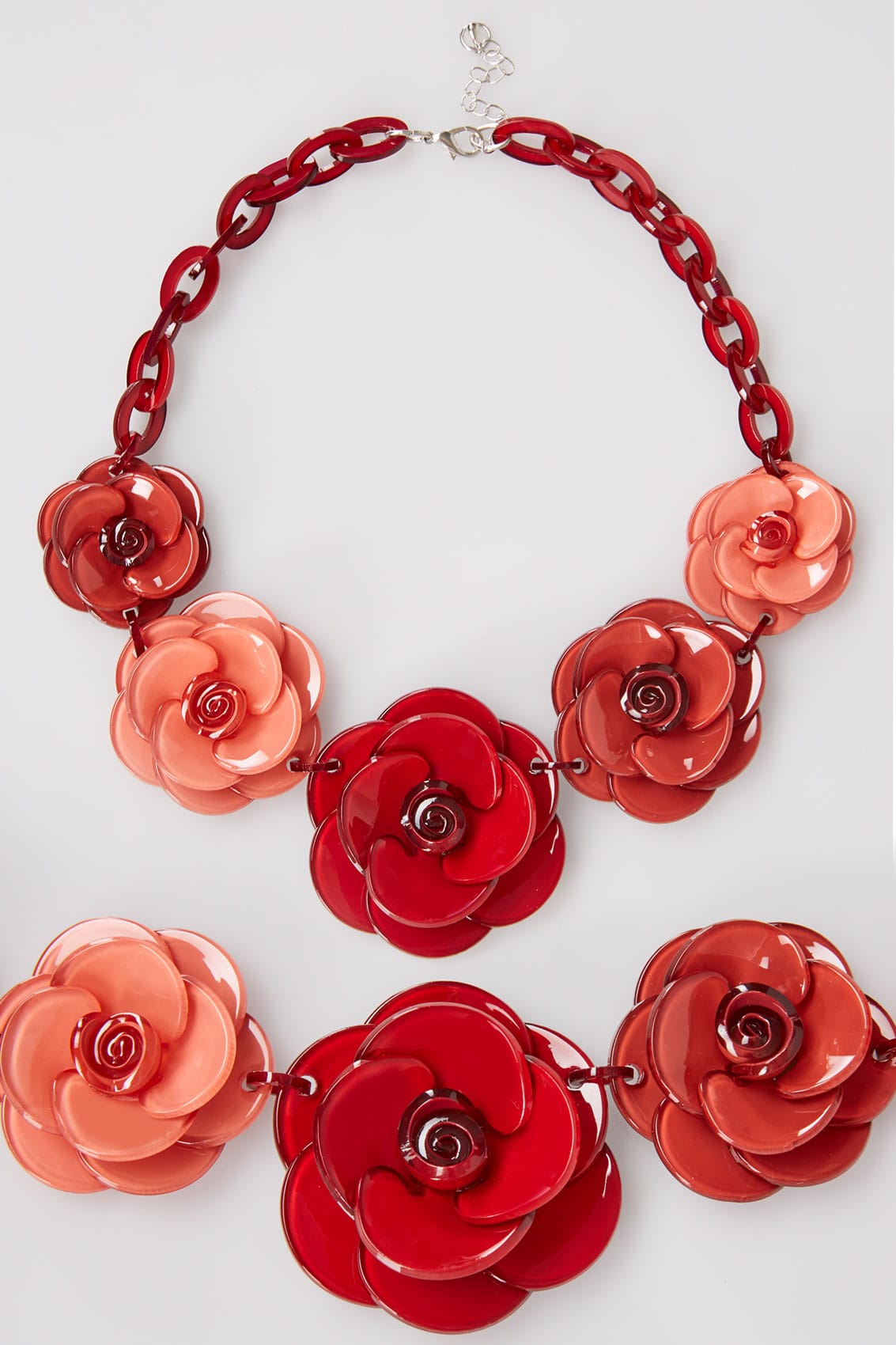 Collier à fleurs en acryliques rouges et rose