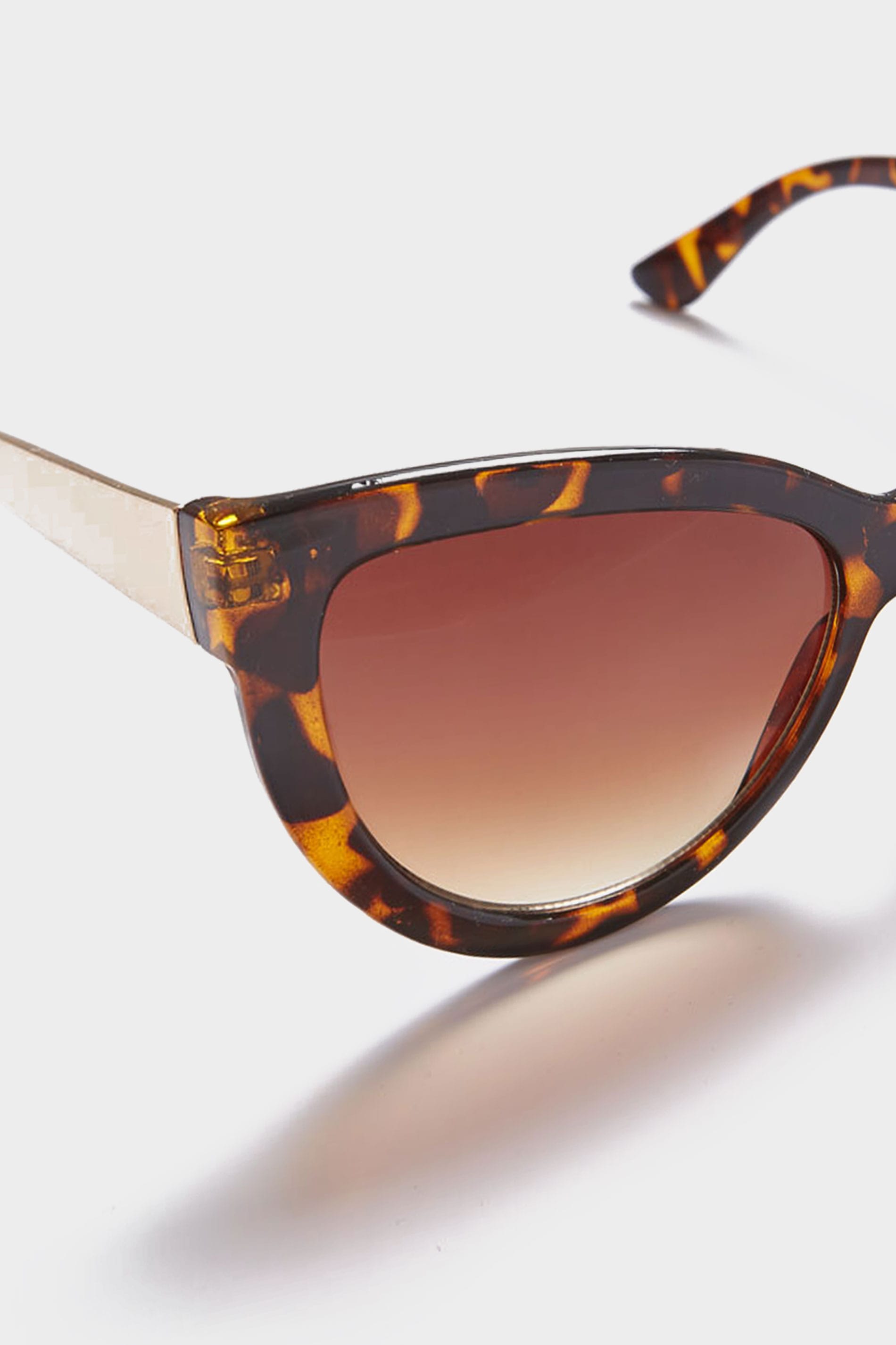 Tortoiseshell Cat Eye Sunglasses With Gold Tone Arms And With Uv 400 Protection