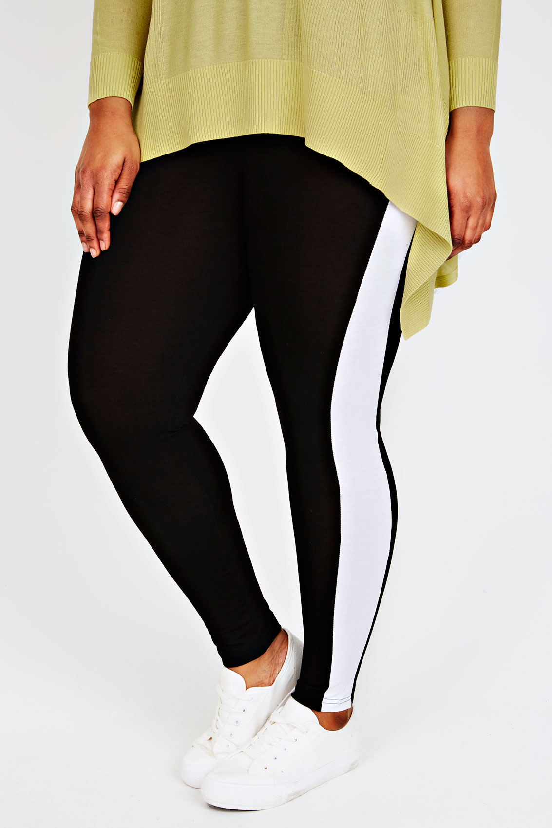 black leggings with yellow stripe down the side